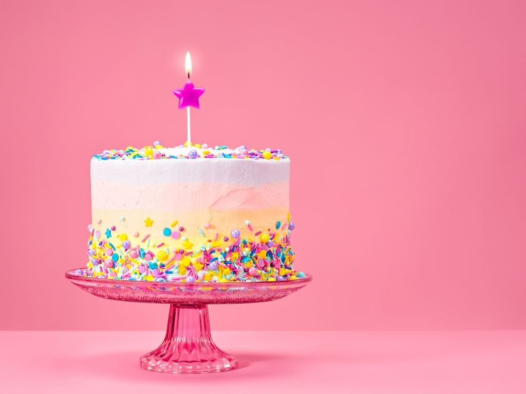 Birthday cake with sprinkles and 1 candle