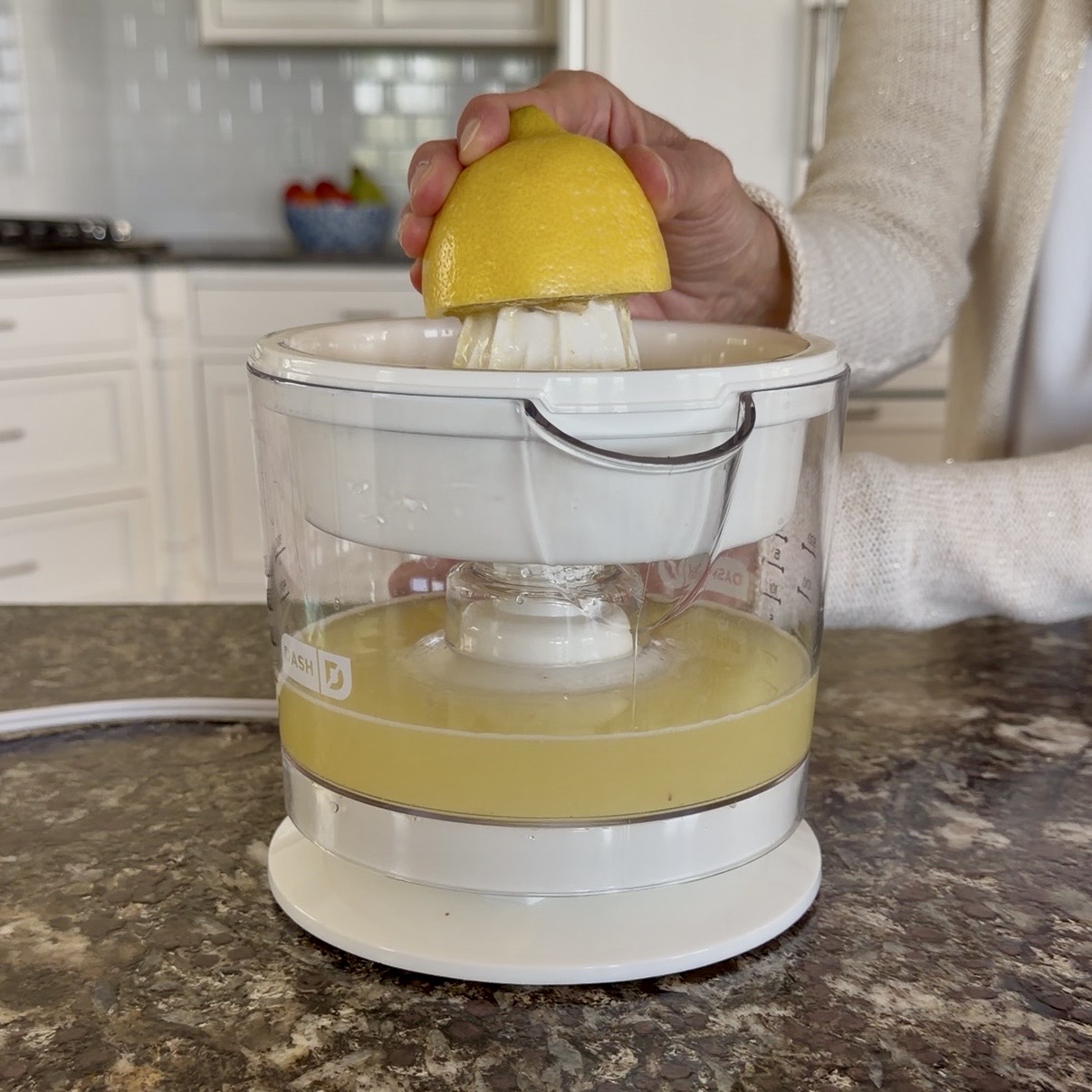 Close up of a lemon being juiced