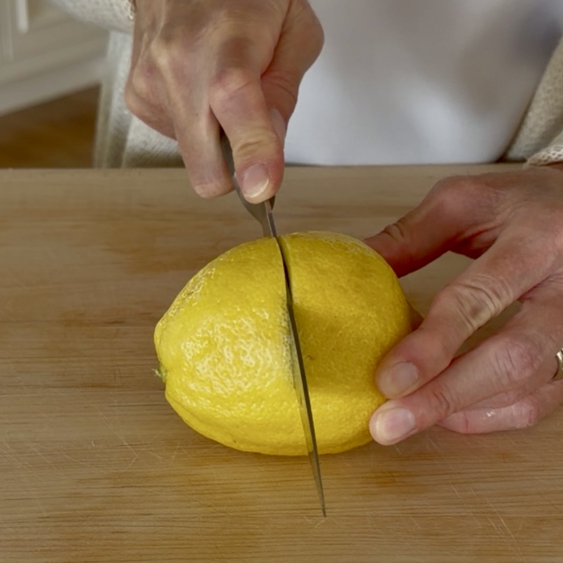 Close up of a lemon being sliced
