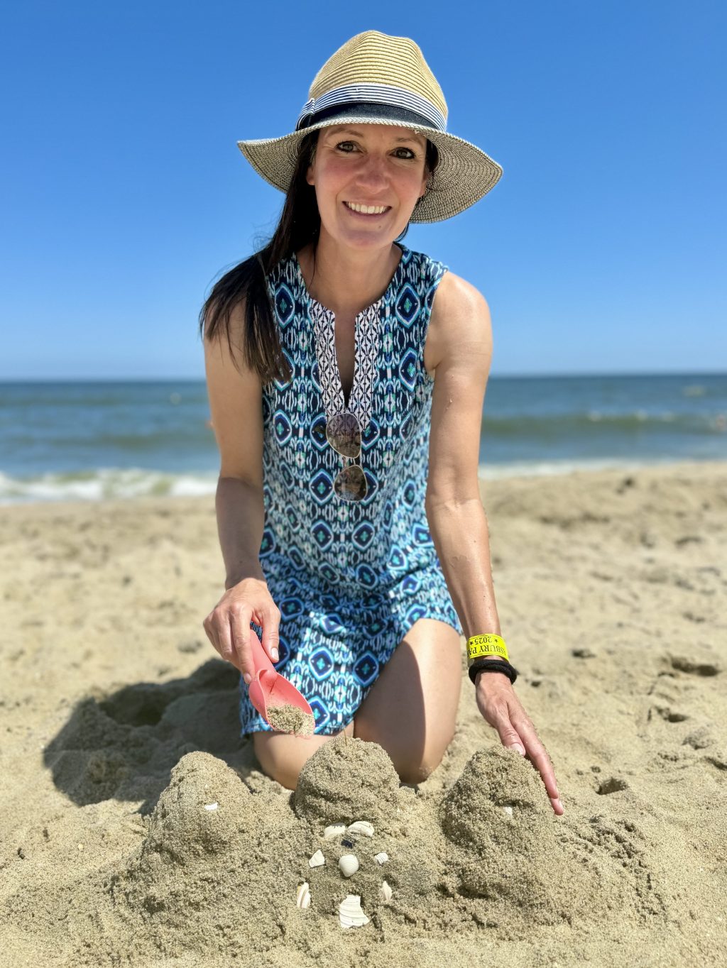 Lauren building a sandcastle on the beach
